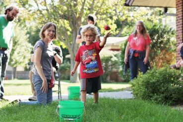 family-plays-game-outside