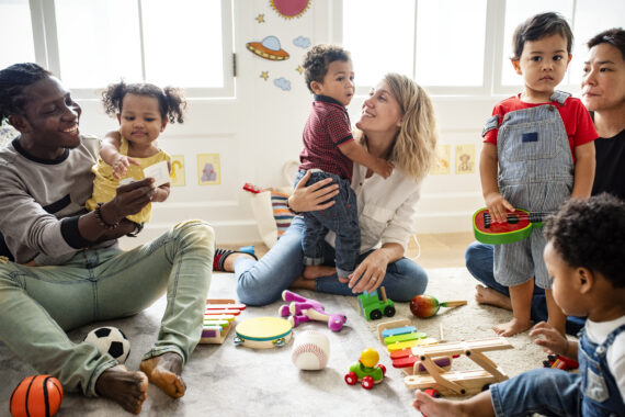 A group of families and kids play together